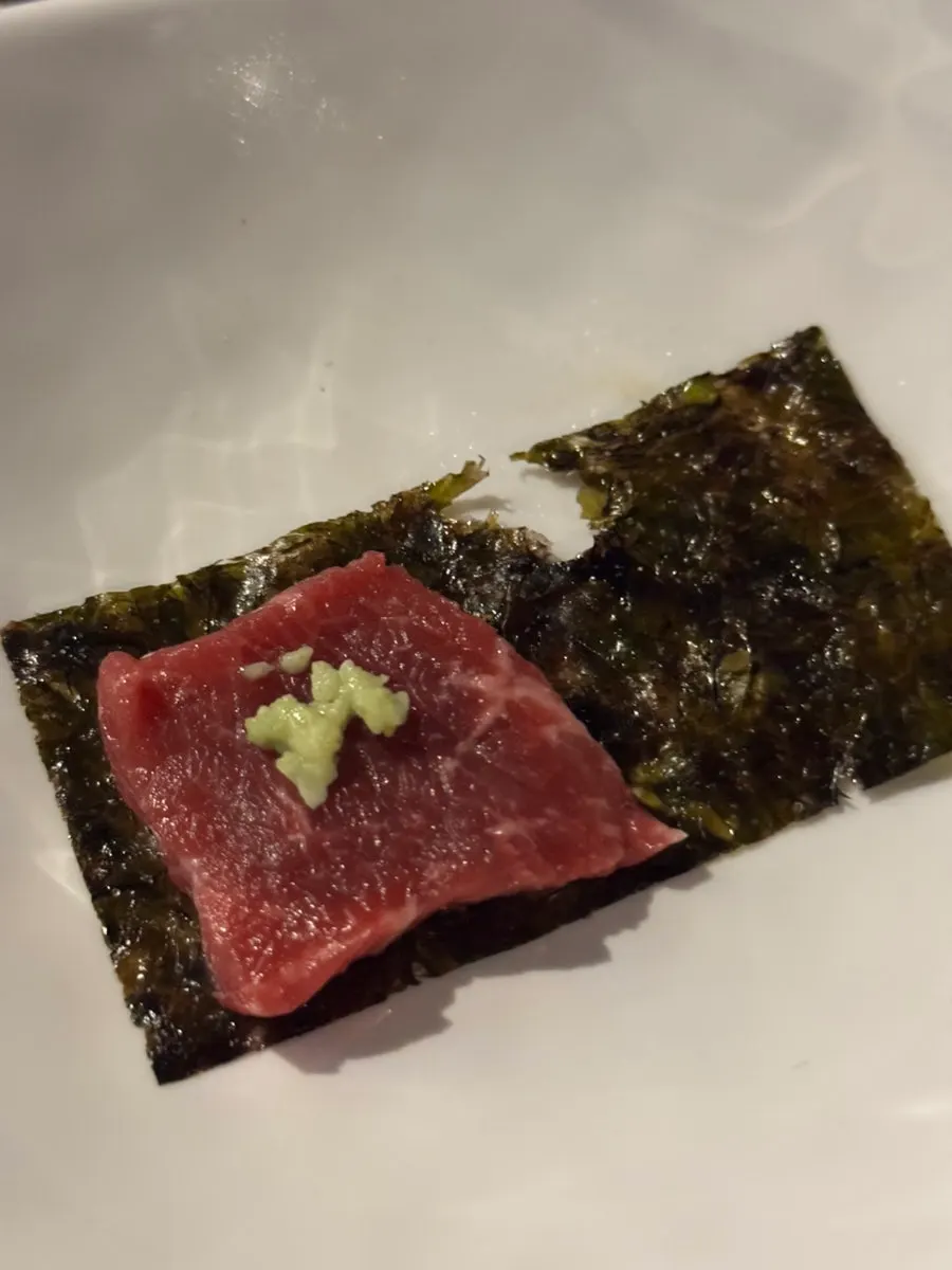 Beef sashimi wrapped in seaweed