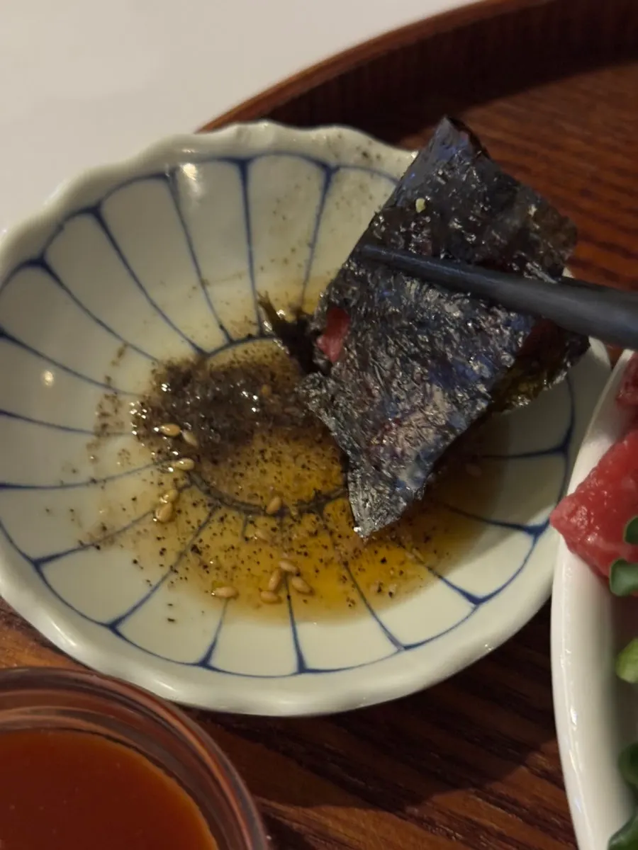 A beef sashimi seaweed wrap ready to eat