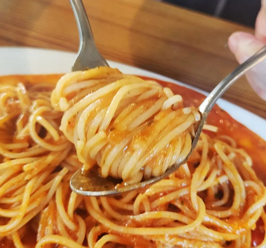Pasta topped with bocconcini cheese