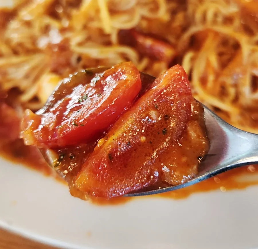 Generous serving of cheese tomato pasta