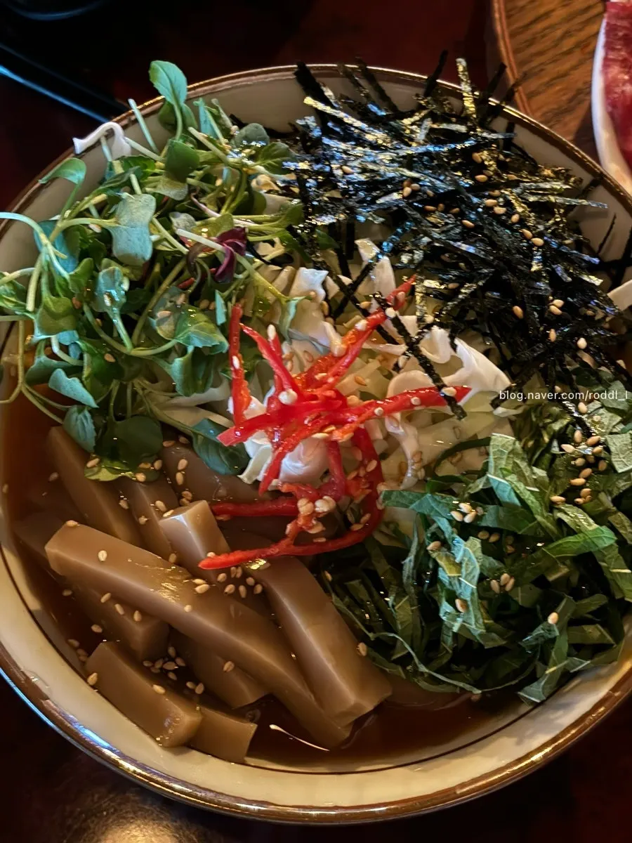 Mukbap loaded with vegetables in cold hoetguk broth