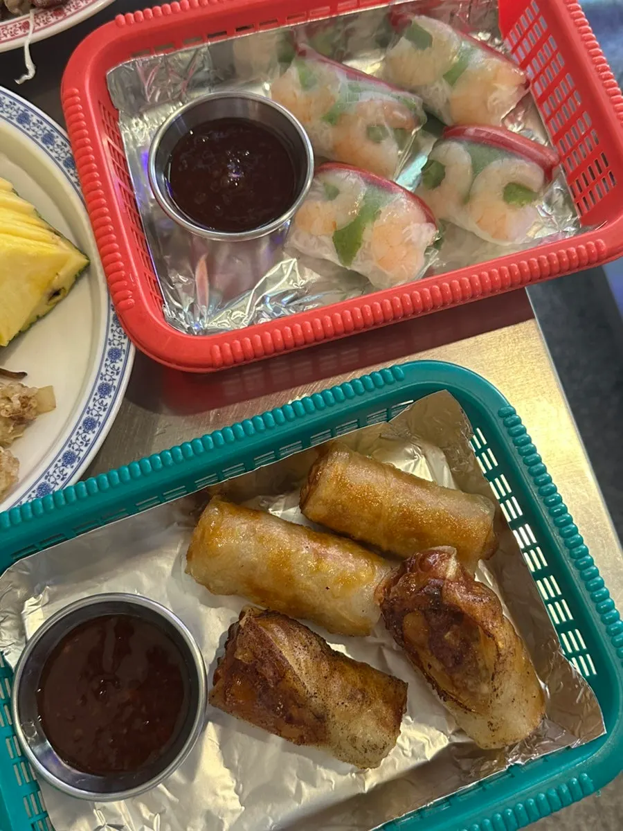 Vietnamese spring rolls and Vietnamese dishes on the table