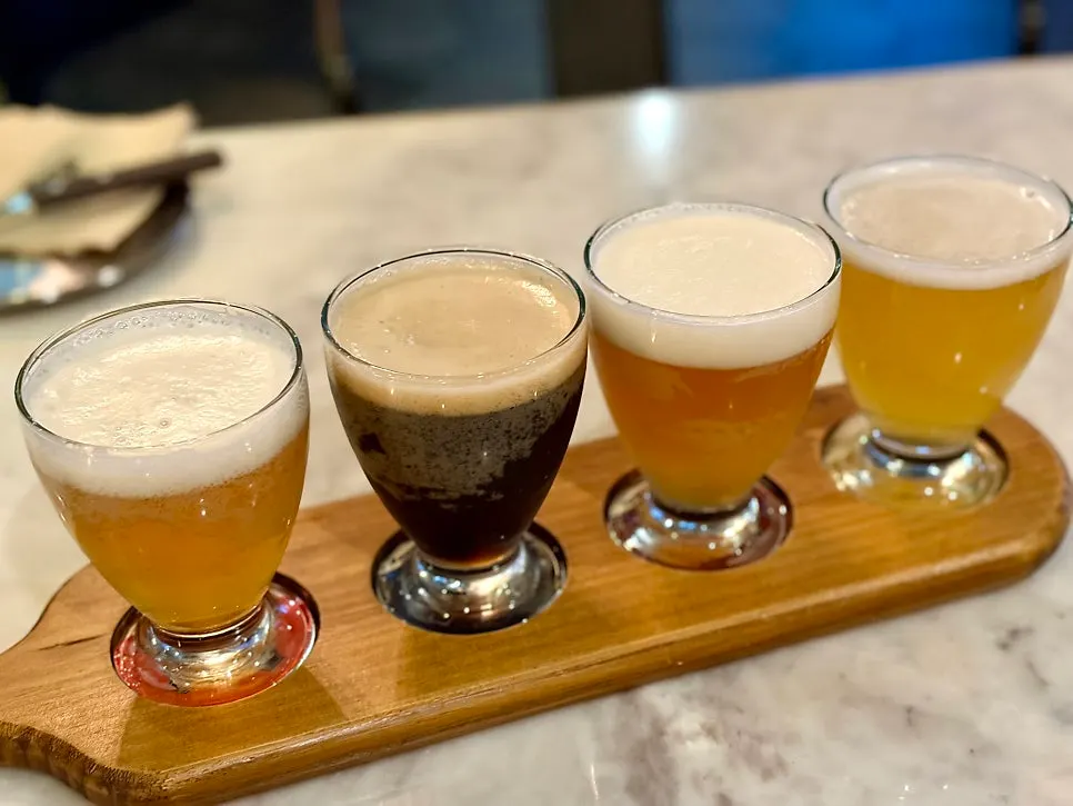 Craft beer sampler placed on the table