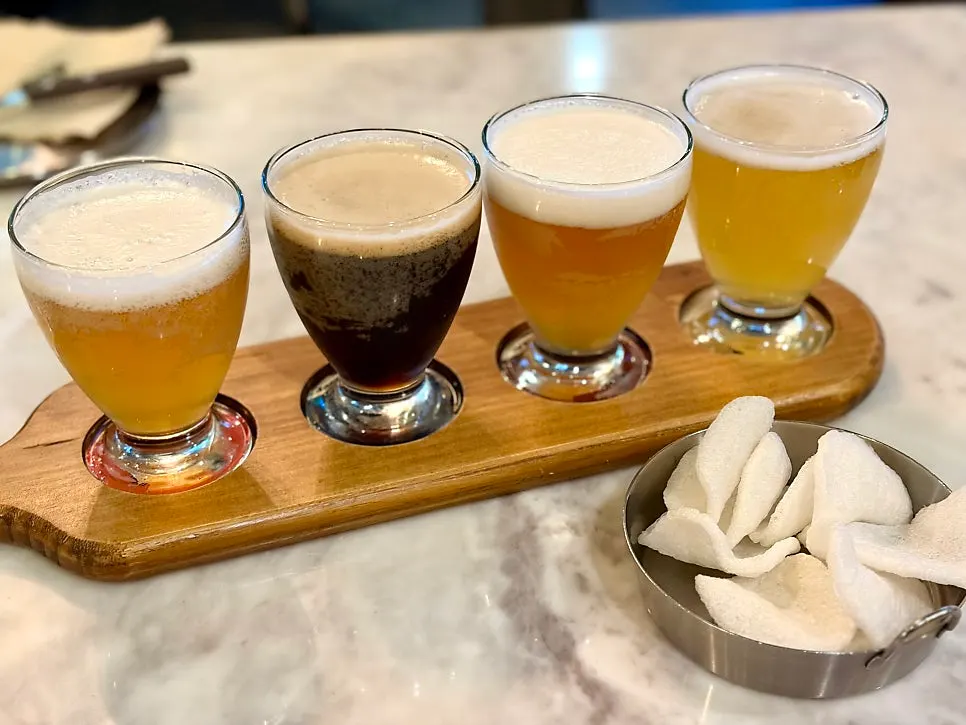 Craft beer sampler glass with several varieties