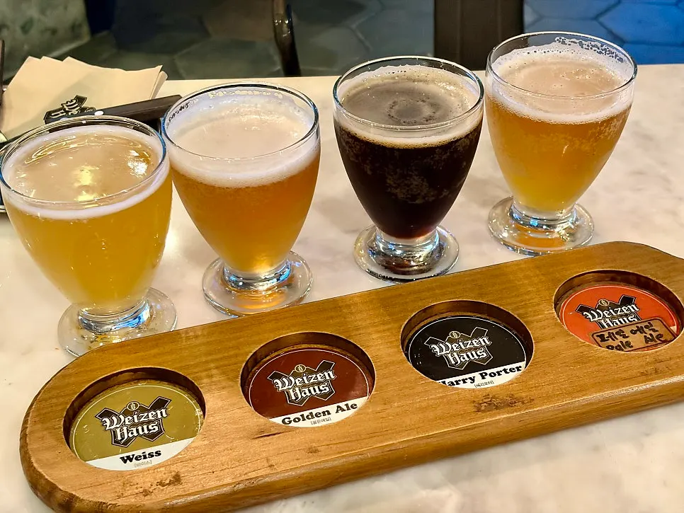 Close-up of craft beer glasses in different colors