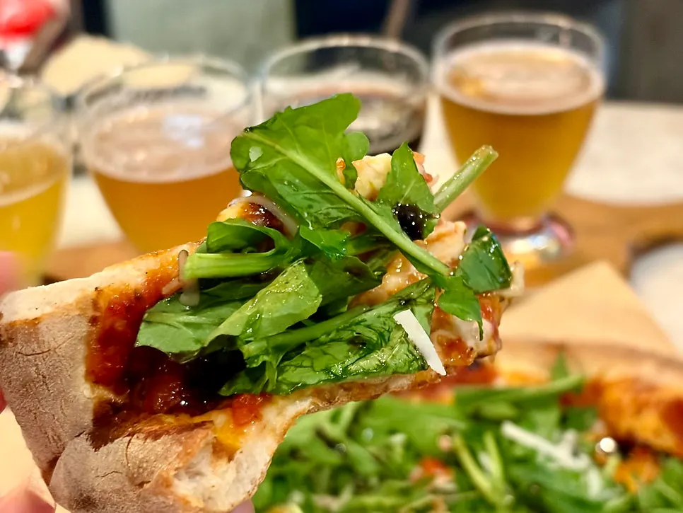 Pizza and craft beer set together, a classic pizza-and-beer spread