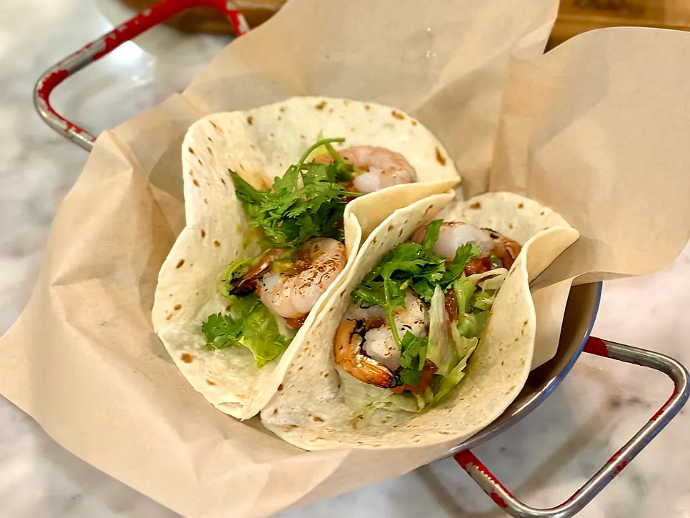 Shrimp tacos topped with shrimp