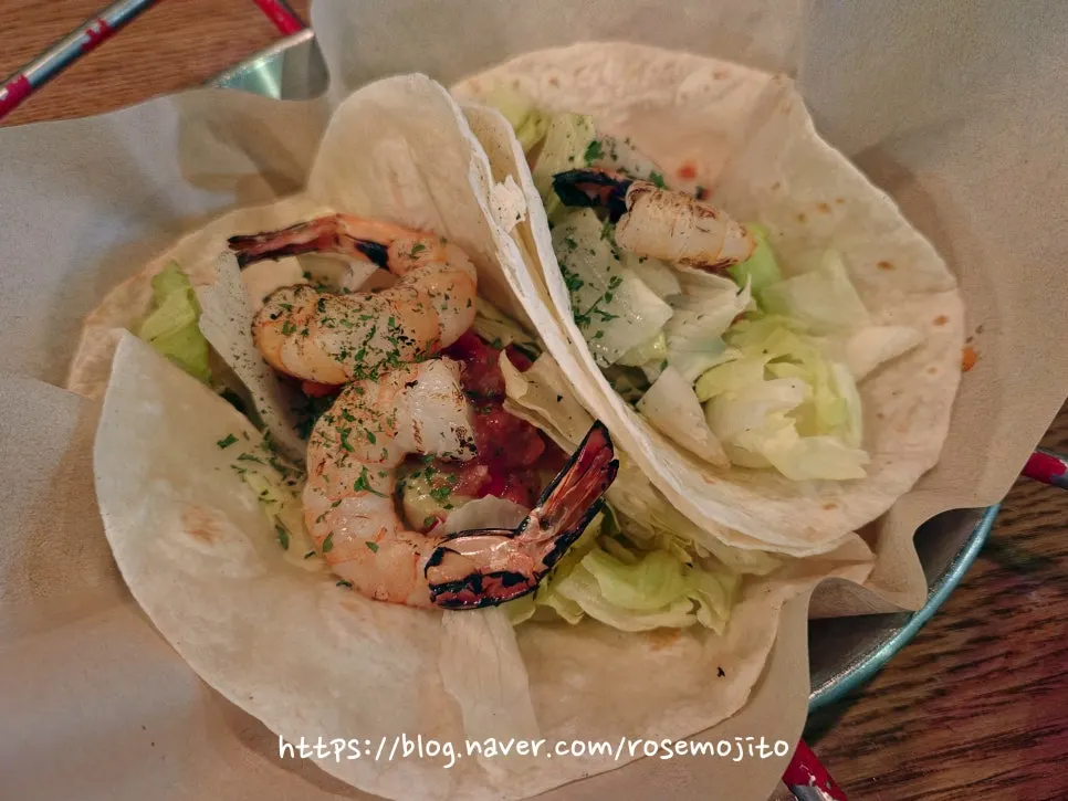 Plate of two shrimp tacos