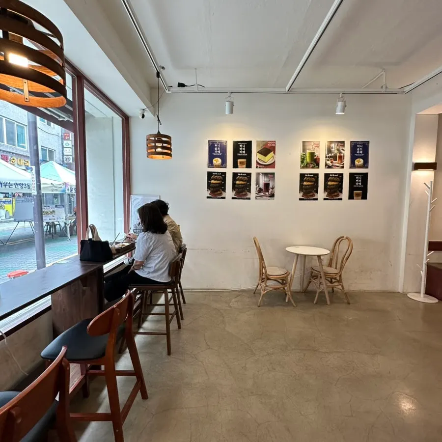 Interior of Saechamcoffee with generous spacing between tables