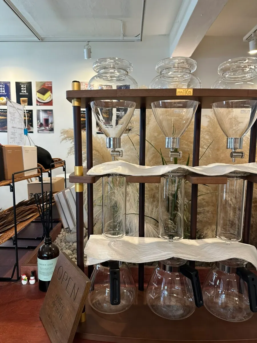 View of a table at Saechamcoffee from the window seat