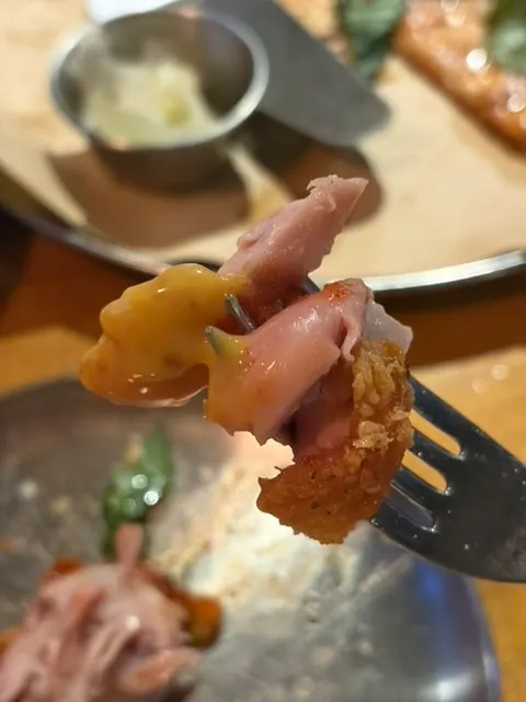 Chicken showing plump, moist meat inside
