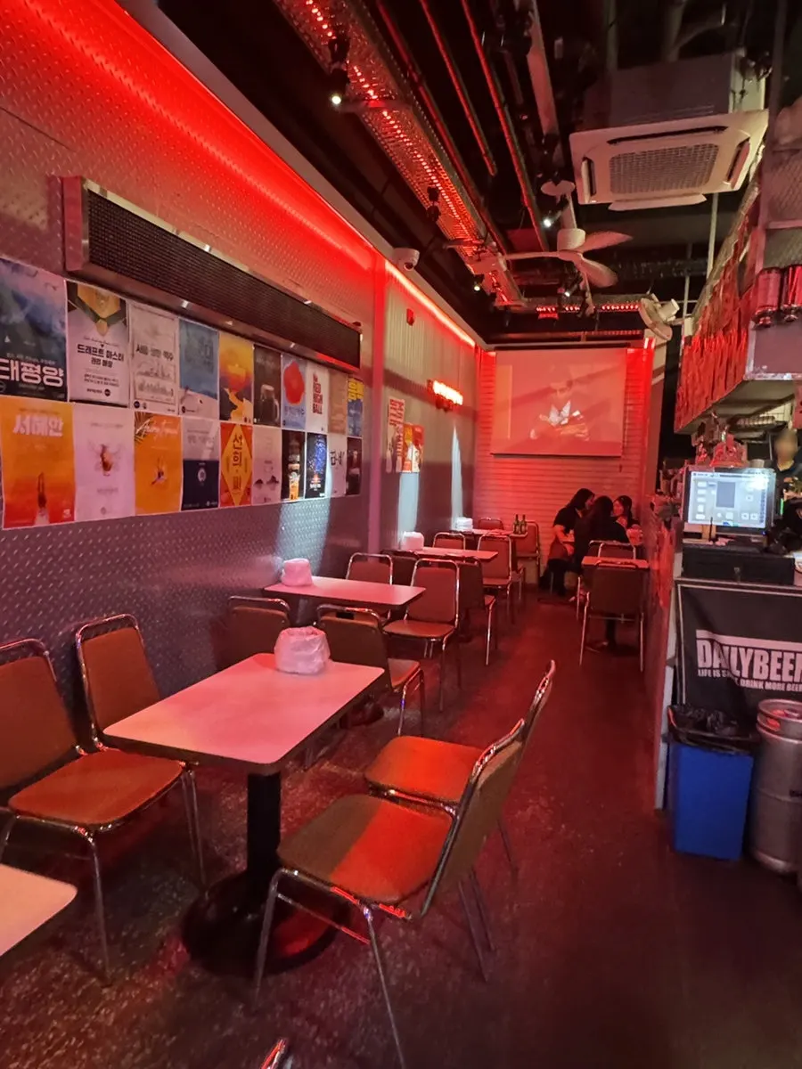 Indoor seating lit with red lighting