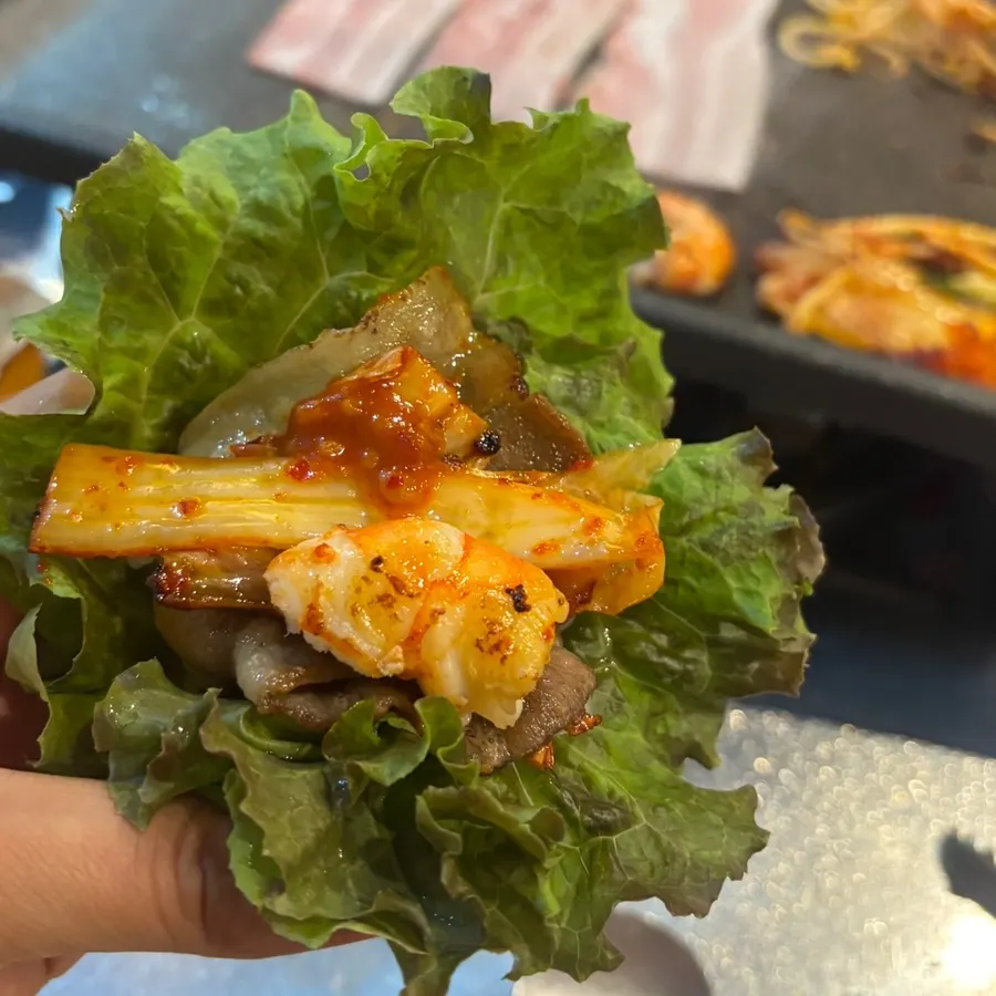 Lettuce wrap with pork belly, shrimp, and scallion kimchi