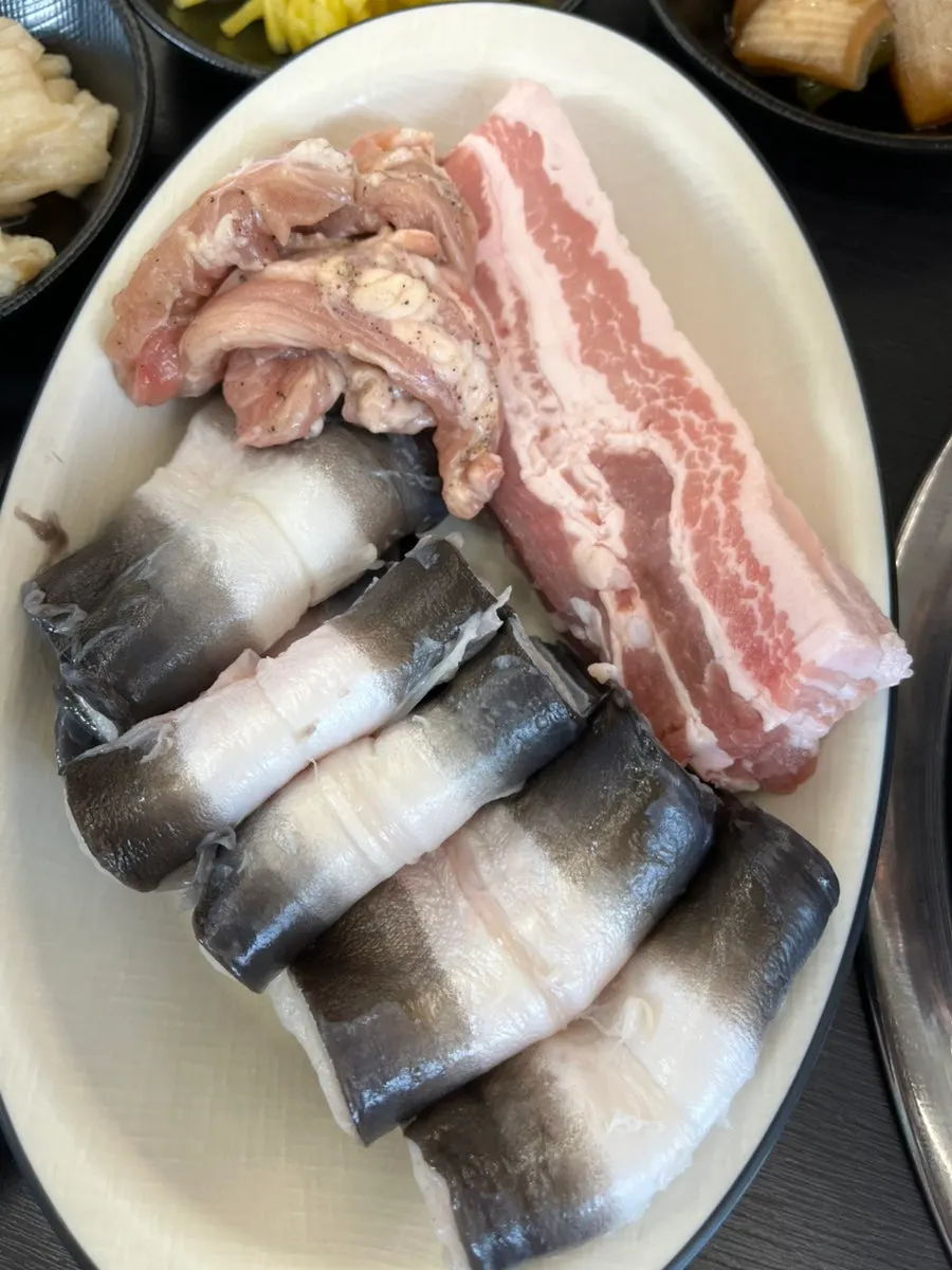 Plump domestic freshwater eel with duck neck meat and pork belly
