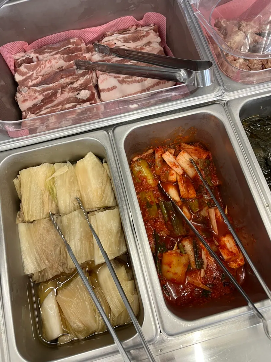 Self-service corner with pork belly and duck neck meat