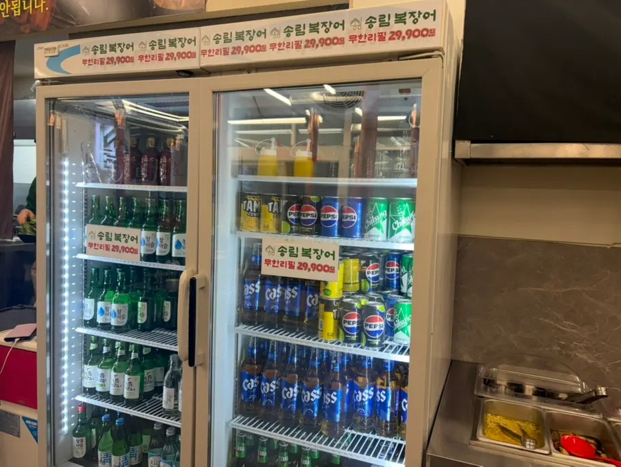 Complimentary bokbunja and information about switching to soft drinks