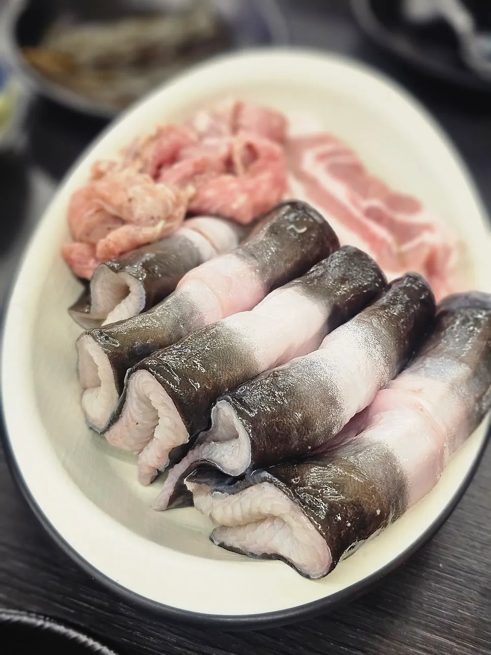 Initial serving of eel and chicken neck meat