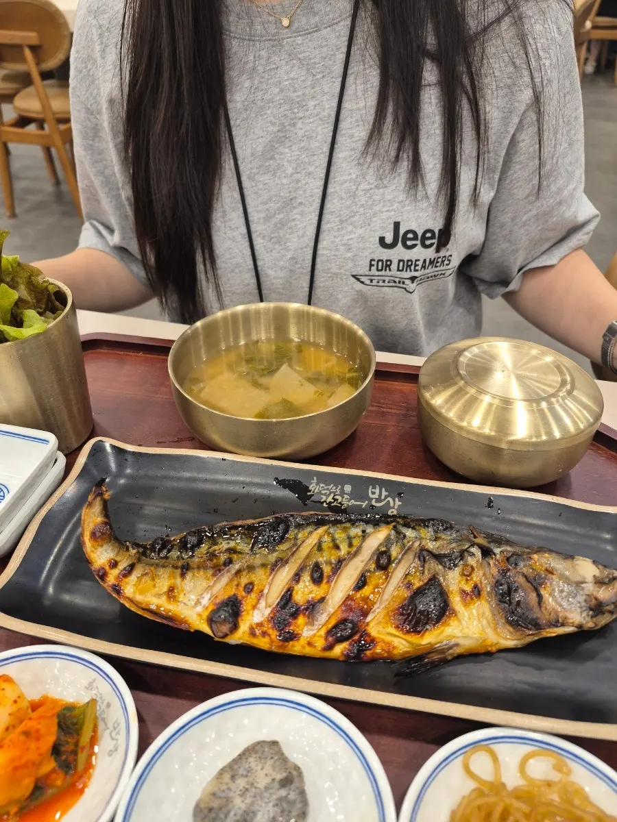 Golden brown wood-fired grilled mackerel