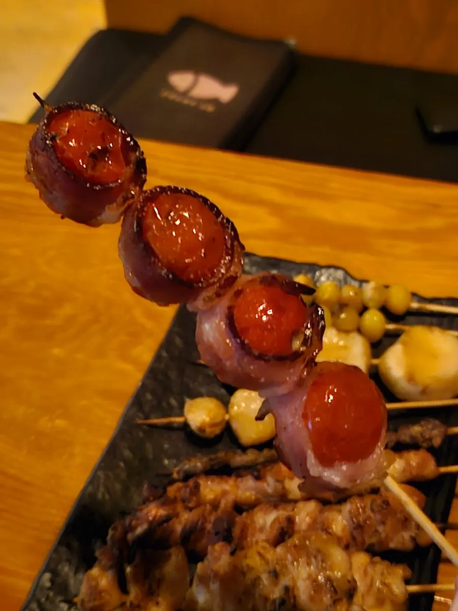 Assorted skewers enjoyed with beer