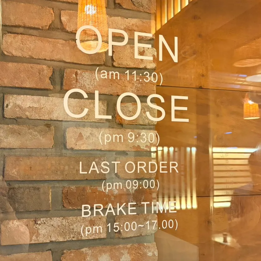 Photo showing hours and parking information