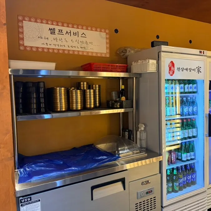 Self-serve side dish bar in one corner of the restaurant