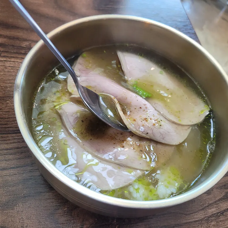 Jeju sanbang-guk-bap topped with scallion pesto