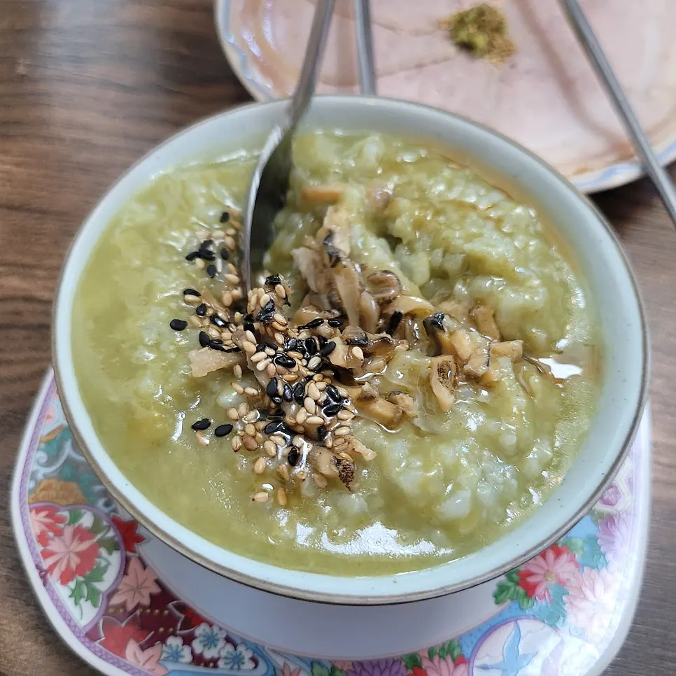Jeju abalone porridge topped with abalone garnish