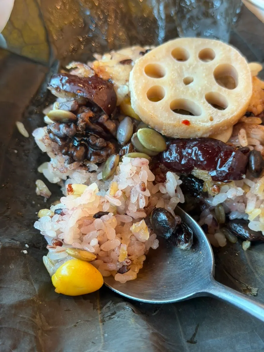 Lotus-leaf rice with ginkgo, beans, lotus root, and walnuts