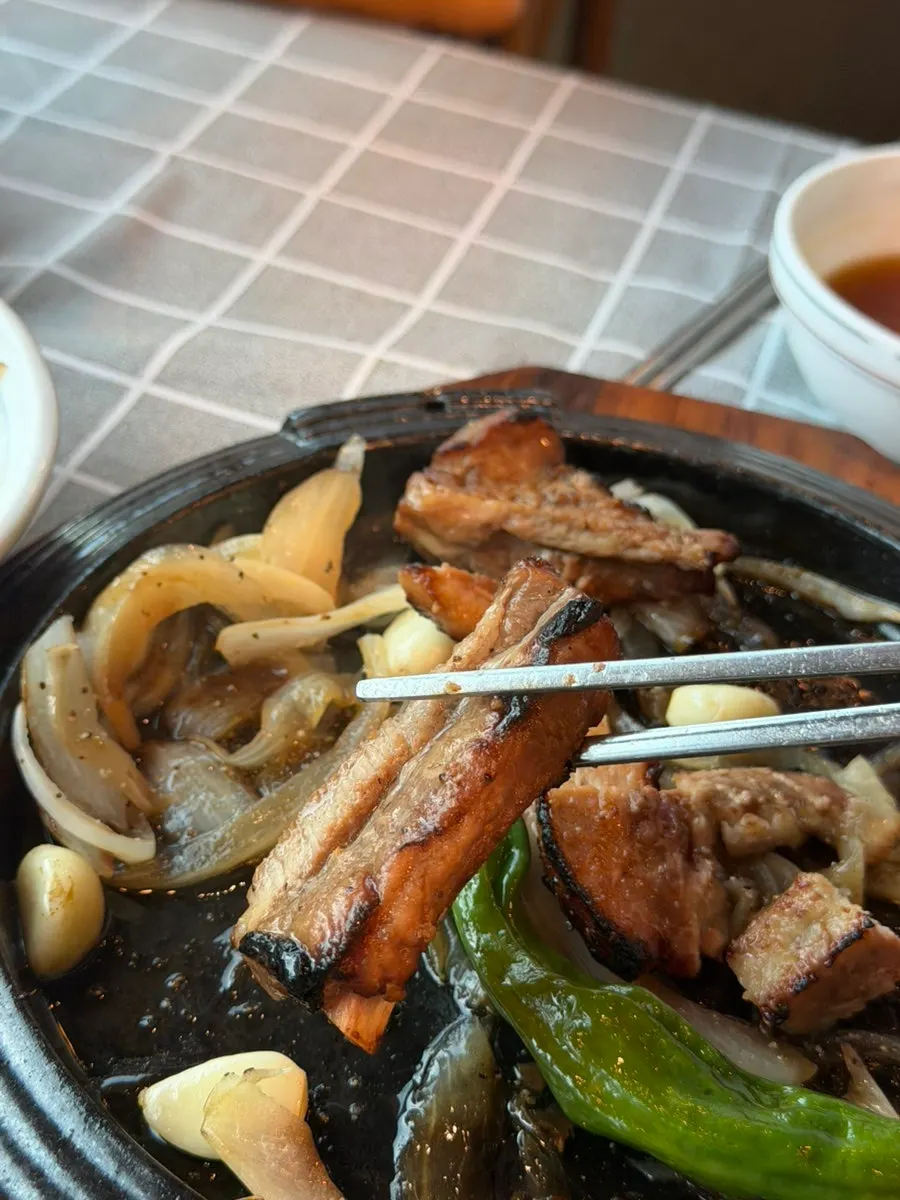 The stone plate with only bones left of the pork galbi