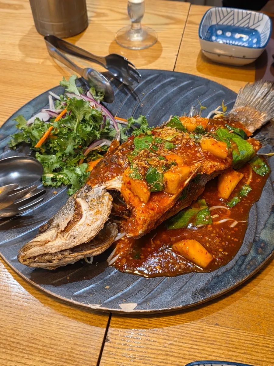 Whole fried chili sea bass at Saeng Augustine