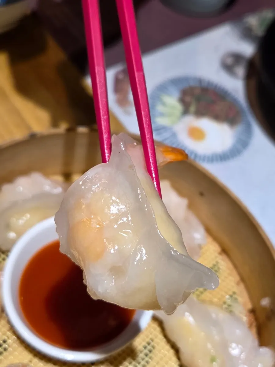 Shrimp hagau served with sauce