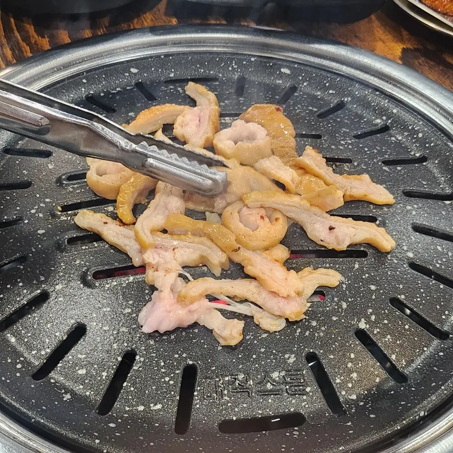 Fresh makchang grilling on the barbecue