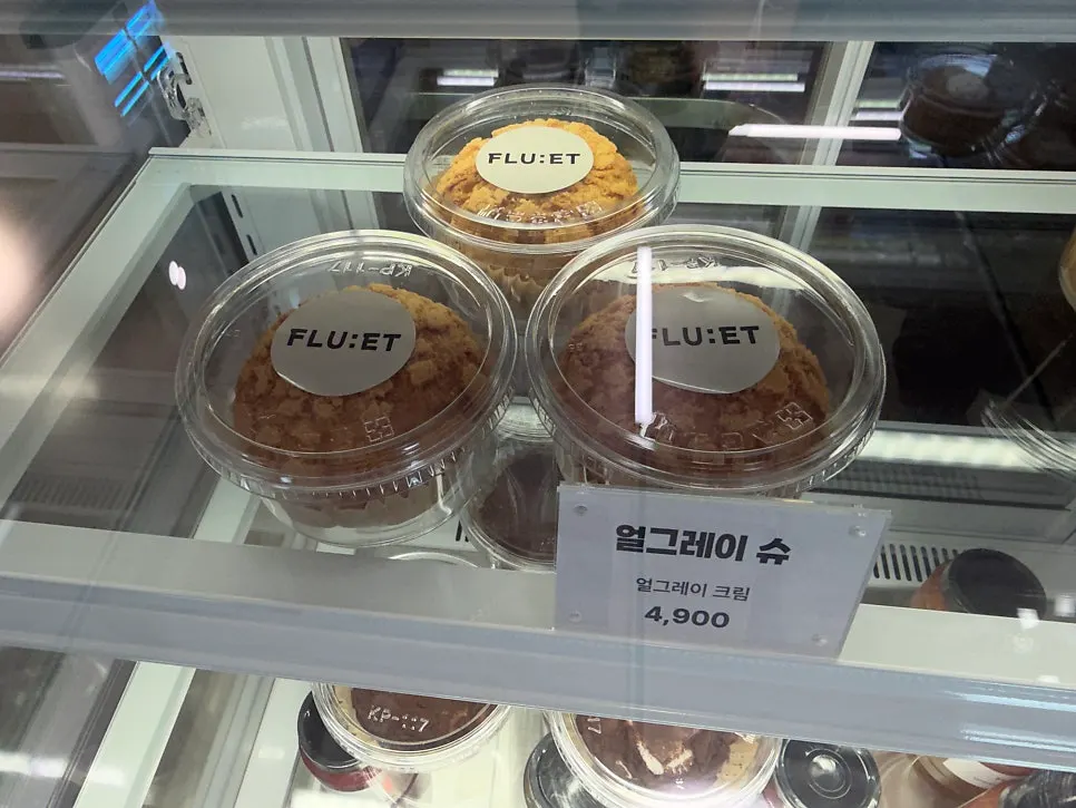 Choux desserts arranged in the display case