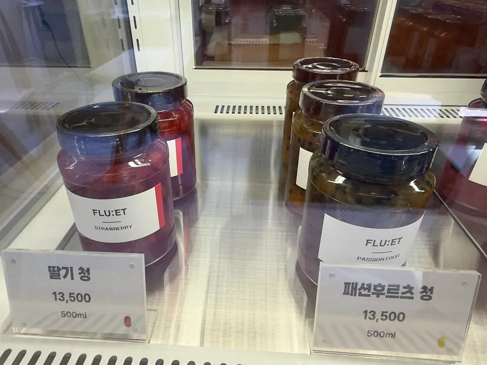 Display of house-made fruit syrups