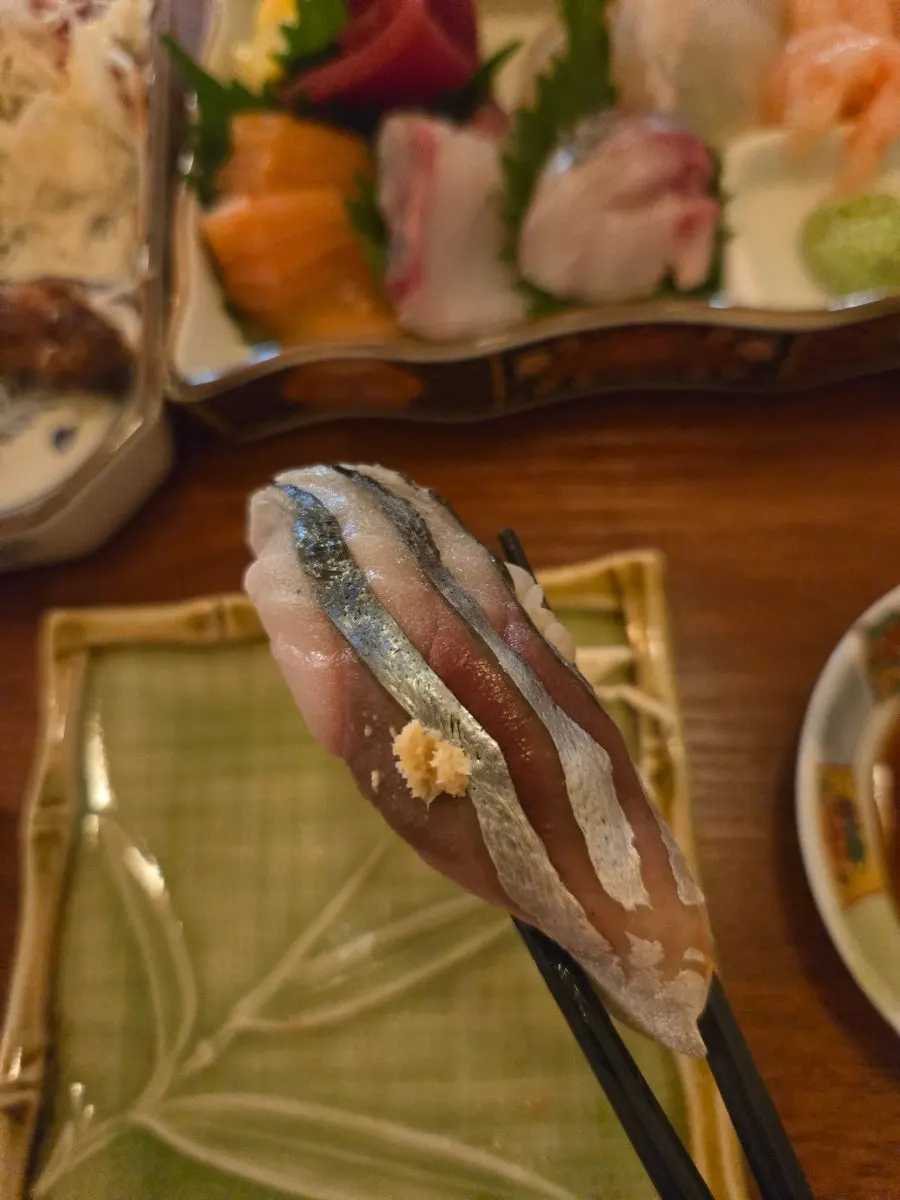 Mackerel sushi stacked like a cone