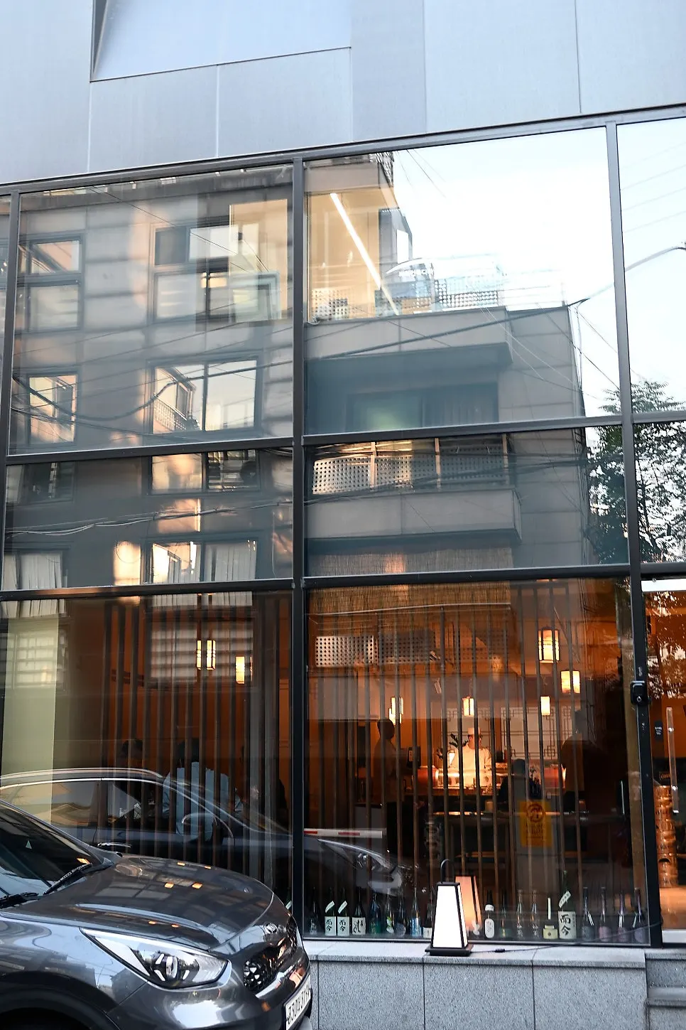 Sakai's unmarked first-floor entrance without a sign