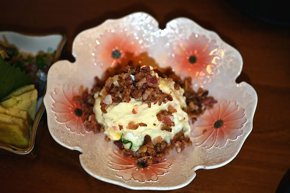 First dish with bacon, corn, and mashed potato