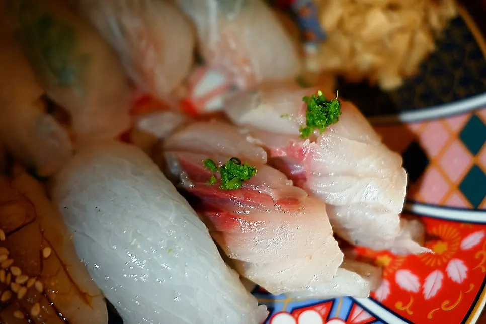 Plate of daily sushi with thick fish toppings