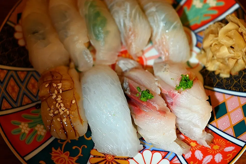 Several types of ordered nigiri sushi