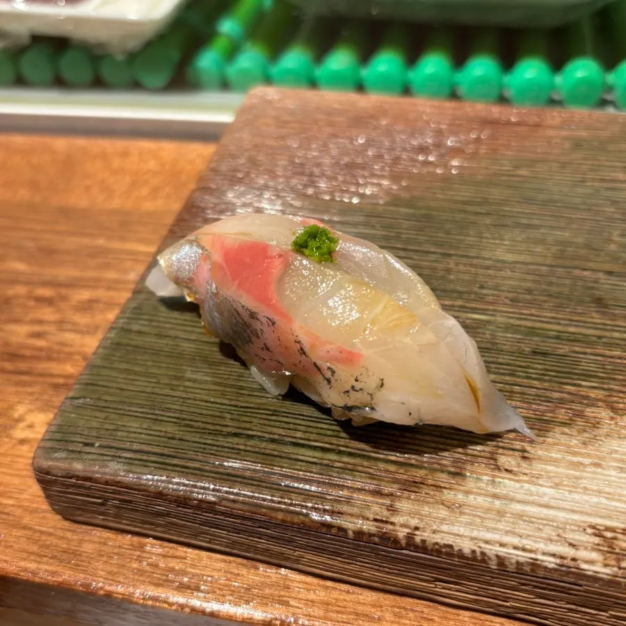 Sweet shrimp sushi topped with kimi sauce