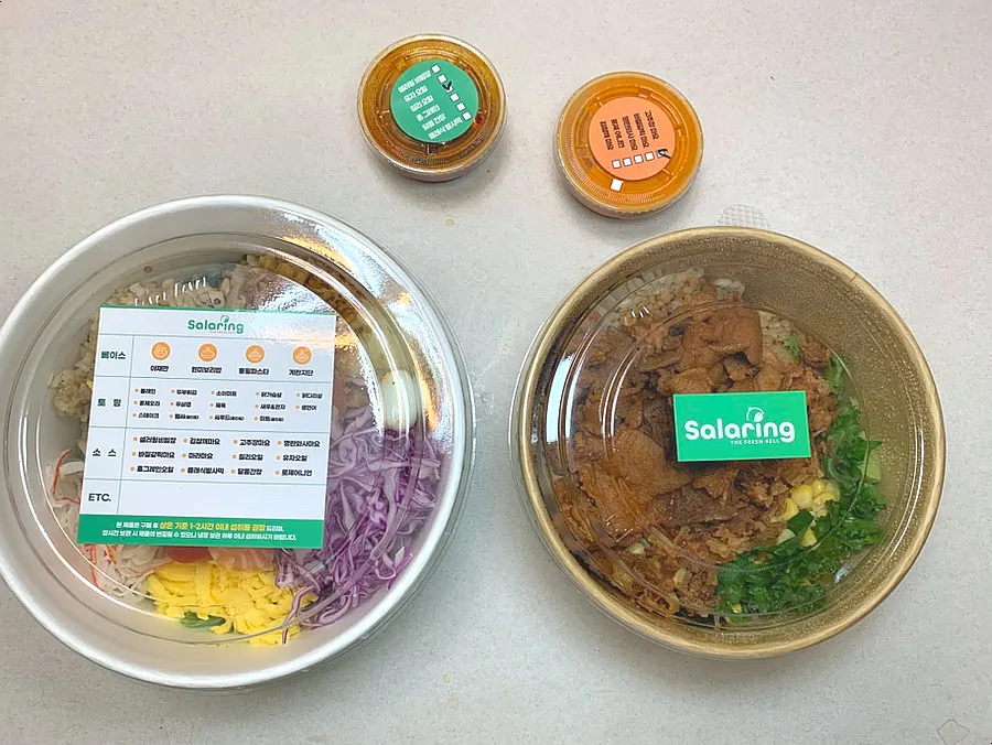 Poke and rice bowl packed in takeaway containers