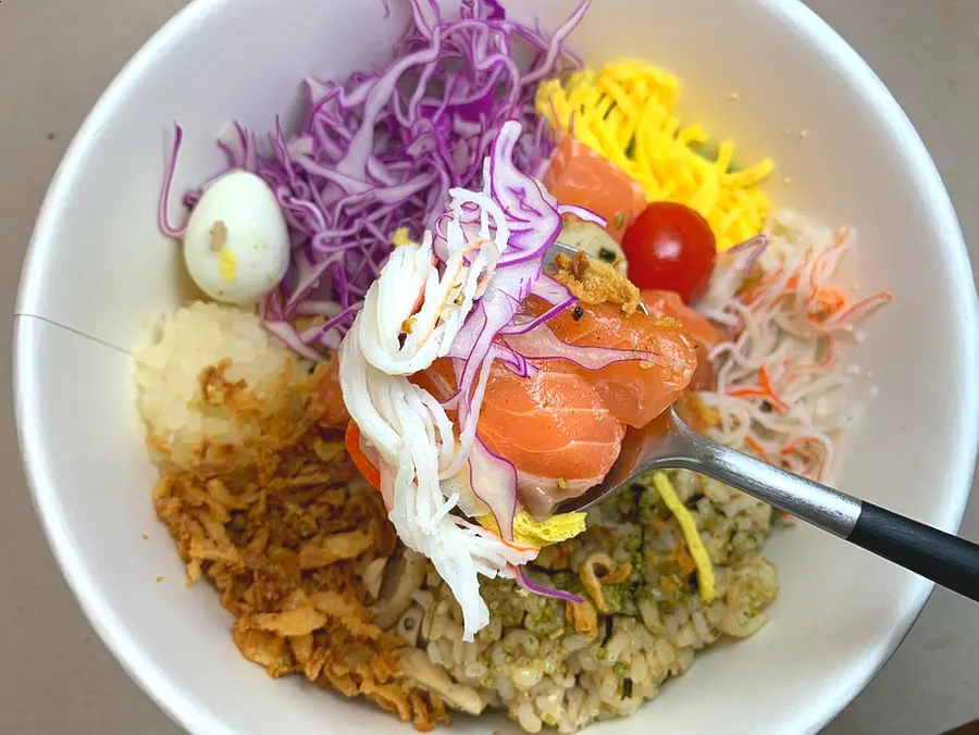 Bibim poke topped with salmon and various toppings