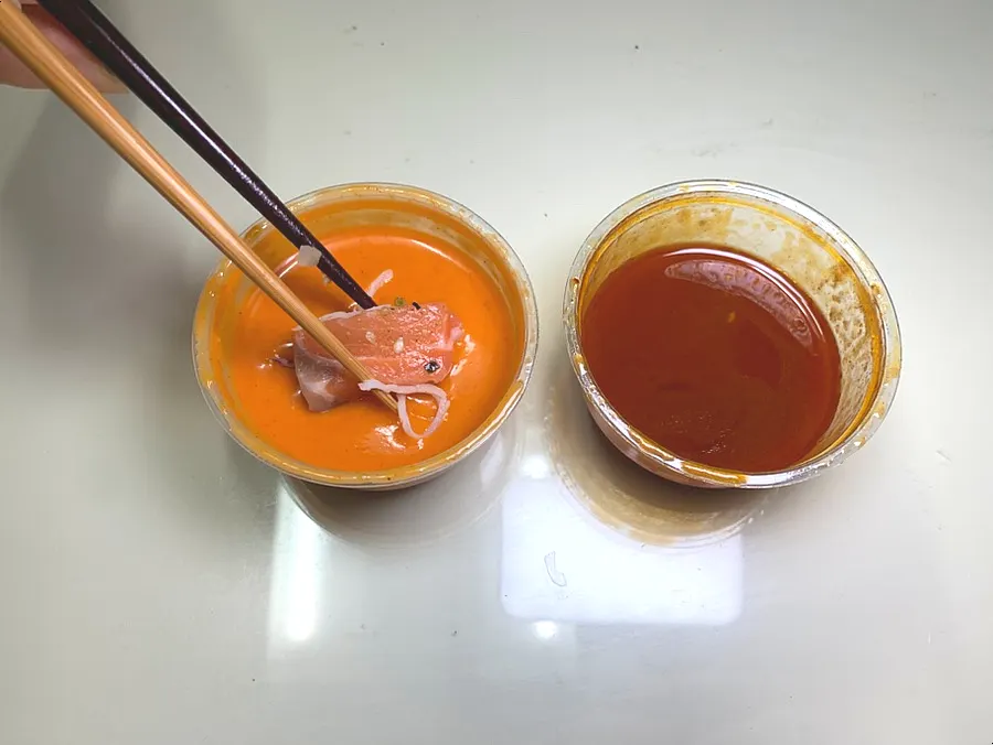 Two dressings: gochujang mayo and chili oil