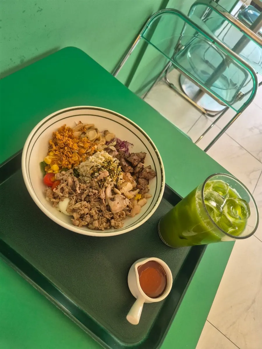 Green juice served alongside the Meat All-in-One
