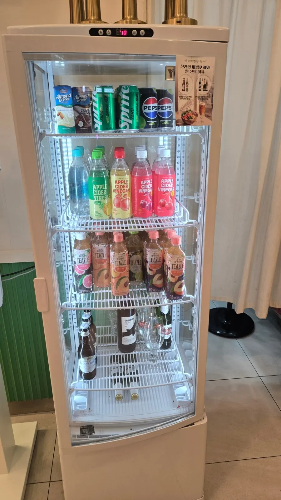 Cleanse juices displayed on a wall