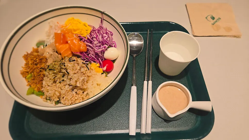 Raw salmon bibim poke served on a tray