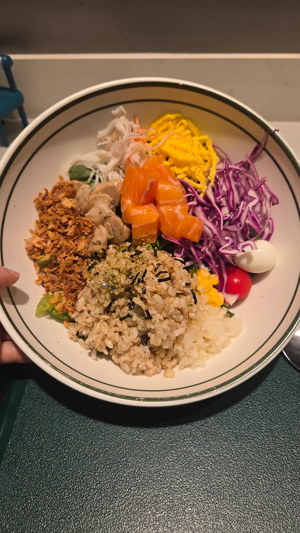 Poke toppings including egg strips, purple cabbage, and corn
