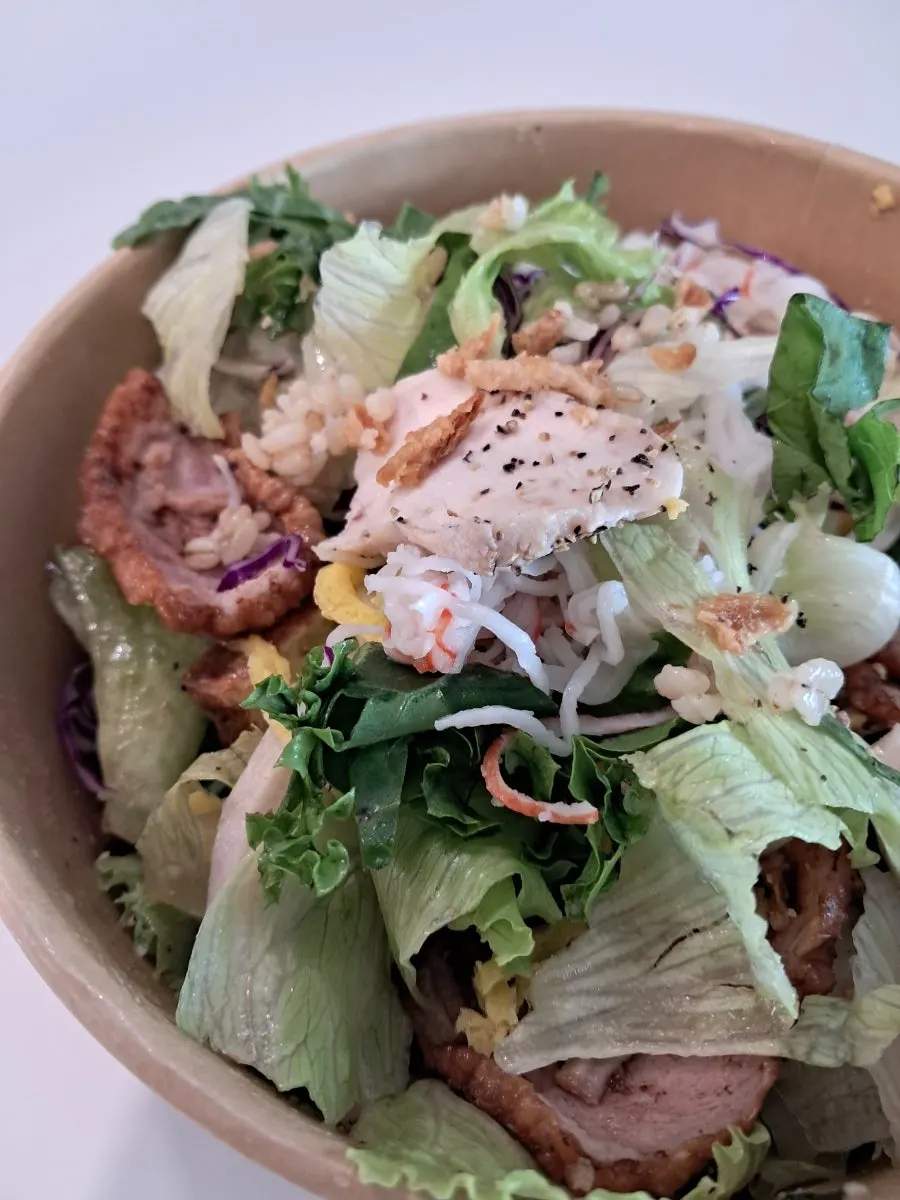 Mixing the Healthy All-in-One Bibim Poke together