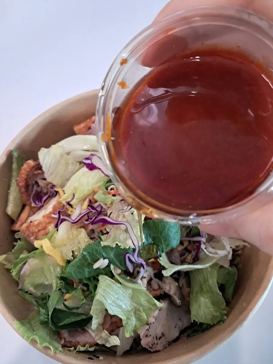Close-up of a spoonful of bibim poke