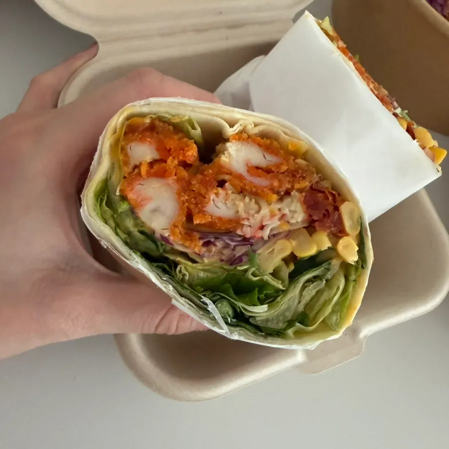 Neatly packaged spicy tender chicken wrap